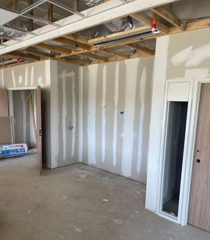Taping and mudding drywall